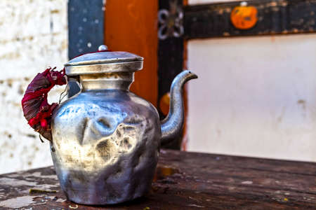 Tea pots made of steel in a Bhutanese monastery (dzong) in the Buddhist Kingdom of Bhutan, Asiaの写真素材