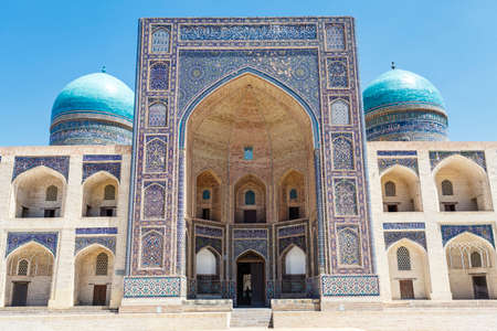Exterior of the Mir-I-Arab madrasa in the center of Bukhara, Uzbekistan, Central Asiaの写真素材