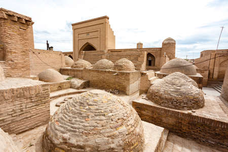 Exterior of an old mosque and madrassa in the khanate of Khiva, Uzbekistan, Central Asiaの写真素材