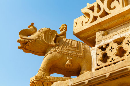 Elephant sculpture with a blind man on the Jian temple Amar Sagar, Jaisalmer area in Rajasthan, India, Asiaの写真素材