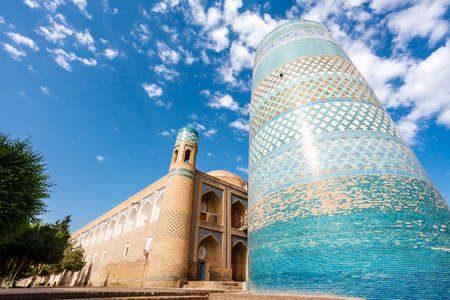 Mohammed Amin Khan Madrassah and the Kalta Minor Minaret in Khiva, Uzbekistan, Central Asiaのeditorial素材