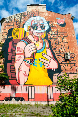 Mural of Albert Einstein as an old sporty man on a wall of an apartment building in Vilnius, Lithuania, Europeのeditorial素材