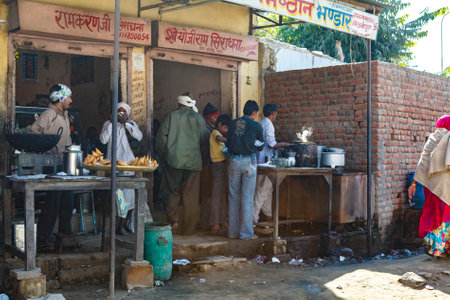 Indian people eating street food in Jaipur, Rajasthan, India, Asiaのeditorial素材