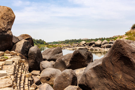 View at the Hampi landscape with big rocks and the Tungabhadra River, Hampi, Karnataka, India, Asiaの写真素材