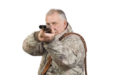 Hunter shooting at target with a double barrelled side by side 20 gauge shotgun isolated on white