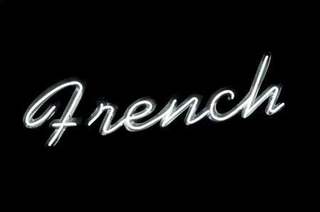 Neon sign with the word "french" over blackの写真素材
