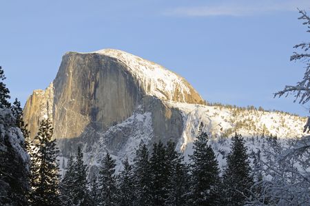 Sun setting on Half Dome in Yosemite valleyの写真素材