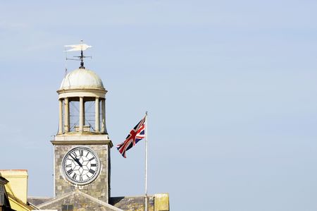 Top of Bridport town hall and Union Jack flyingの写真素材