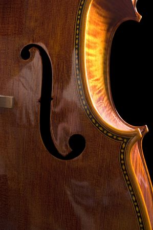 beautiful cello over a black backgroundの写真素材