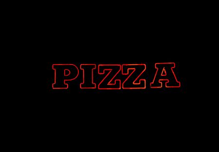 Red neon sign over black wioth the word PIZZAの写真素材
