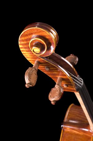 beautiful cello over a black backgroundの写真素材
