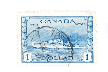 CANADA - Circa 1940 : A vintage Canadian postage stamp image of a navy destroyer value of 1 dollar, series circa 1940の写真素材