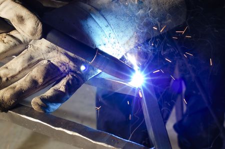 close up of Blacksmith welding on decorative handrailの写真素材