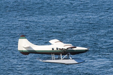 single-engined Seaplane coming in to land in Ketchikan, Alaskaの写真素材