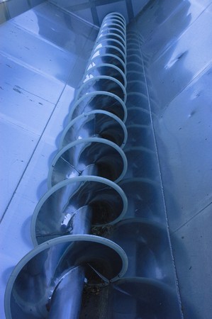 auger in winery for moving grapes up to crusherの写真素材