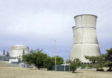 reactor and cooling towers of a now defunct nuclear power plantの写真素材
