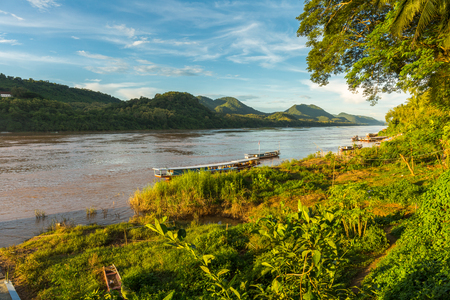 Tour boats on the Mekong River in Luang Prabang, Laosの写真素材
