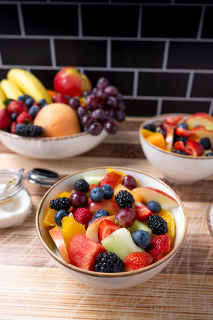 Fresh cut fruit in bowlsの写真素材