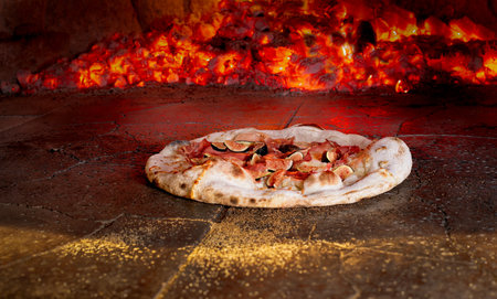 Pizza in brick oven heatedの写真素材