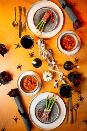 Halloween asparagus plated with decorationsの写真素材