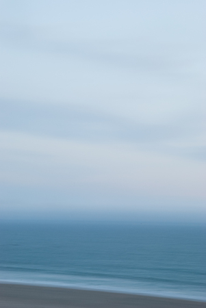 Slow shutter seascape misty beach - Verticalの写真素材