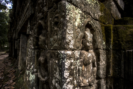 Siem Reap Angkor Wat apsara dancer ancient stone carving on wall and pillarの写真素材