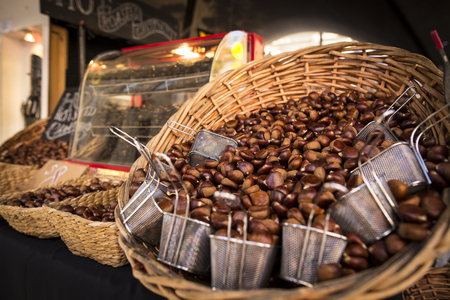 Chestnut in basket for sale in weekend marketの写真素材