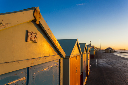 Brighton colorful beach hut beach house along the coast of Brighton Pier.のeditorial素材