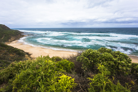 Blue ocean and crashing waves at Castle Cove Lookout Melbourne Australia Great Ocean Roadの写真素材