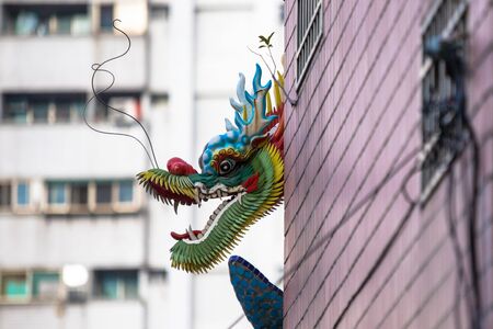 Dragons and mythical animals as decoration commonly seen on roof of Chinese temples around Asiaの写真素材