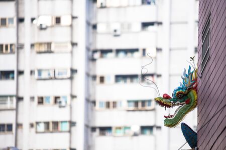 Dragons and mythical animals as decoration commonly seen on roof of Chinese temples around Asiaの写真素材