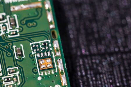 Macro close up view of computer electronic board, part and connector