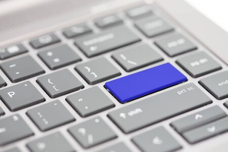 Blue blank white enter key on keyboard background visual for word replacementの写真素材