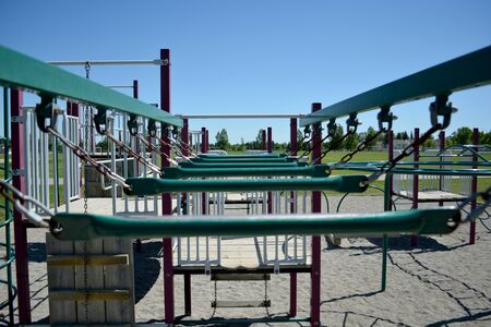 Colourful playground monkey bars in school yard.