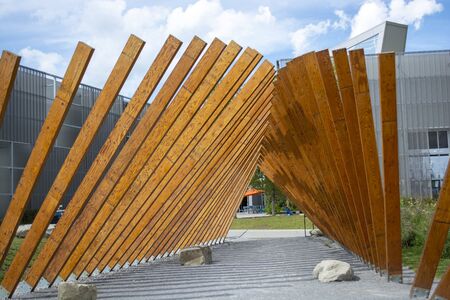 Outdoor wood public artwork installation display walk through
