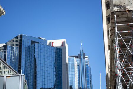 Modern office sky scrapers and buildings downtown with construction