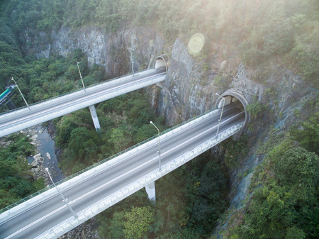 Scenic mountain highway roads connected by bridge in Hong Kongの写真素材