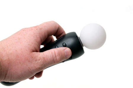 Hand holding a motion control.の写真素材