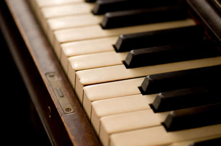 Close up of an old piano. 