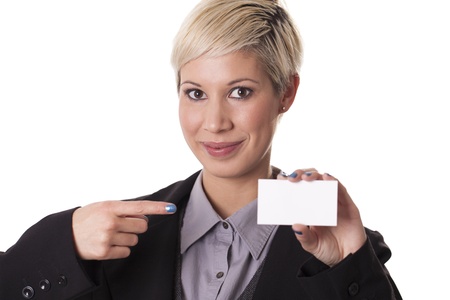Trendy businesswoman holds a blank business card isolated on white background の写真素材