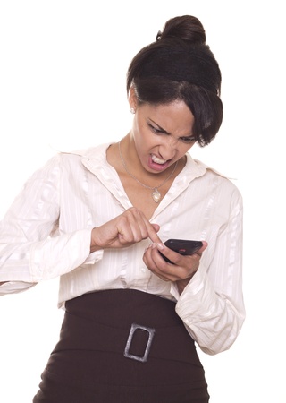 Attractive business woman texting angry message の写真素材