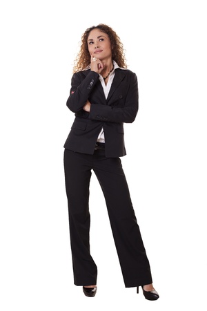 Woman in professional business attire looks to the side, deep in thought, isolated on white background の写真素材