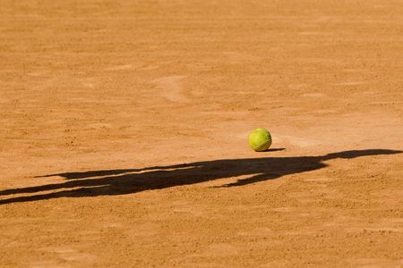 A baseball player is going to the ball to begin the match.