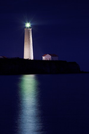 Night shoot of Twilight on Cap-des-Rosiers Lighthouse in forillon National Park.  Quebec, Canadaの写真素材