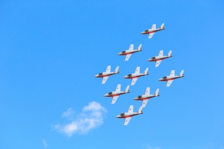 Bagotville, Canada- June 22, 2013: The Bagotville Airshow is a 2 days airshow where the Bagotville Airport opens to the public with a variety of aerial performers as well as aircraft and vehicles on display. This image shows The Canadian Snowbirds aerial のeditorial素材