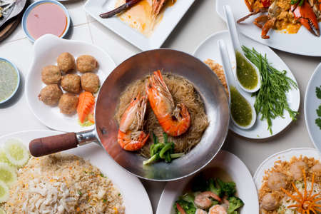 Shrimp potted with vermicelli and another seafood dishの写真素材