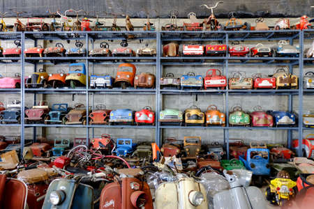 a lot of old toy cars and bikes collectionの写真素材