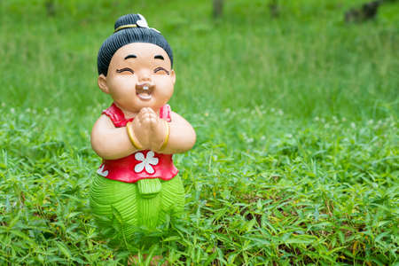 smile baby doll statueの写真素材