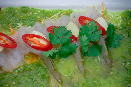 raw shrimp in green chili fish sauceの写真素材