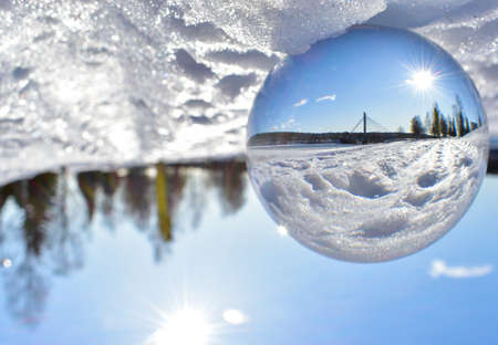 Lens ball in a snowy setting of Finnish Laplandの写真素材